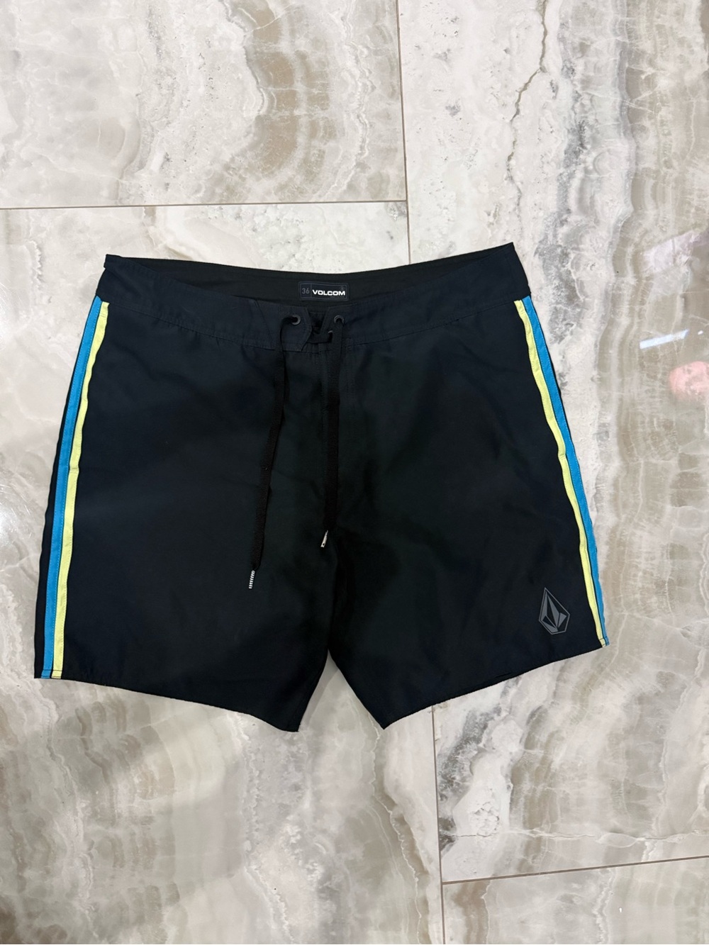 Volcom Men’s Black Swim Trunks with Blue and Yellow Side Stripes